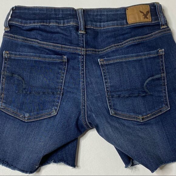 American Eagle | MIDI Stretch Cutoff Denim Shorts - Picture 3 of 5